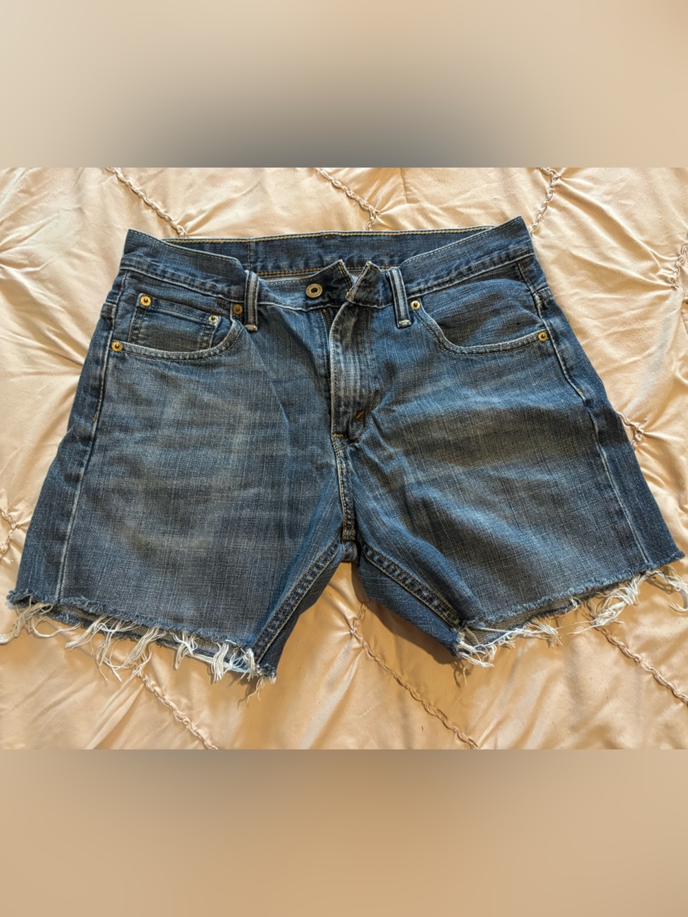Levi's Medium Blue Frayed Hem Denim Shorts